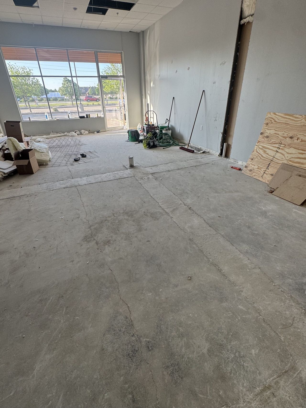 Commercial interior stripped to the slab during demolition