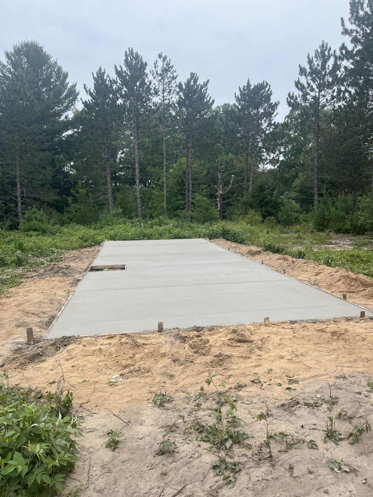 Cleared and graded building pad ready for construction