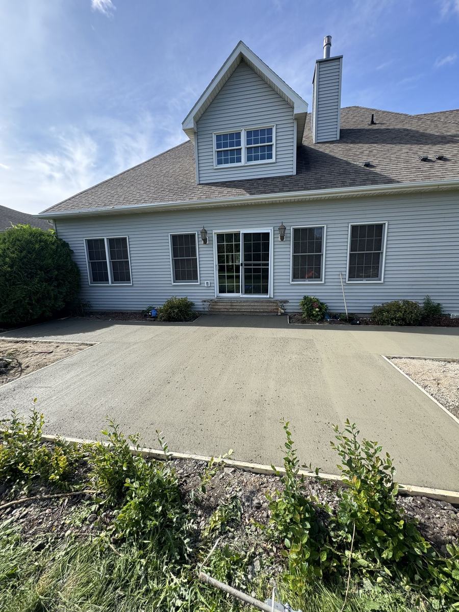 New concrete patio pad by OARA at a Fargo-area home