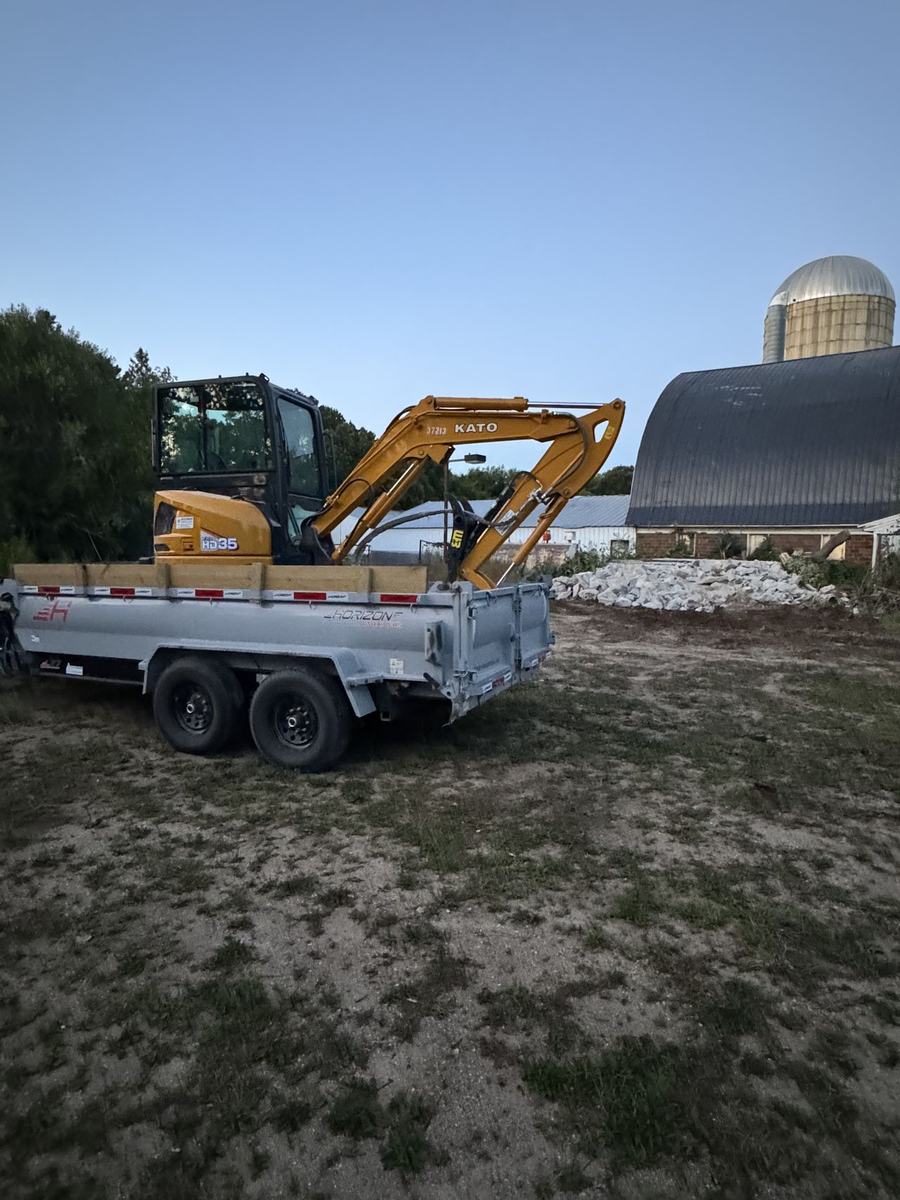 OARA excavator on a Fargo-area job site